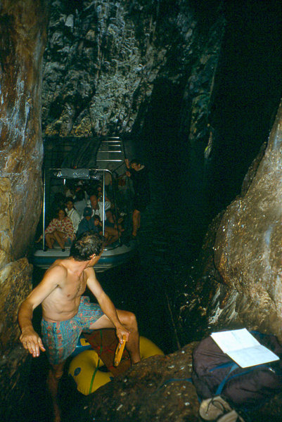Stephan Moser and tour boat at entrance to Bat Cave Storms River Mouth
